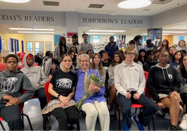 Tova Clark and students at Notre Dame High School